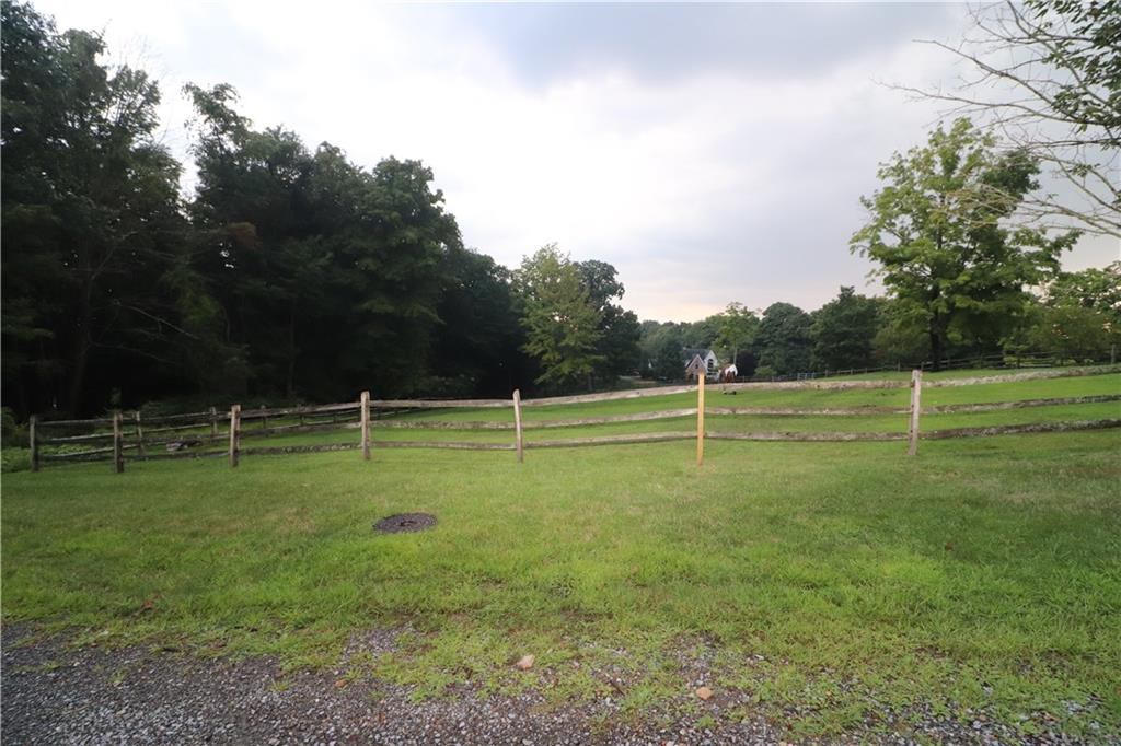 415 Redgate Road Sewickley, PA 15143 - Photo 8 of 25 Neighboring property. Lot 52 begins on the other side of the lefthand fence line.