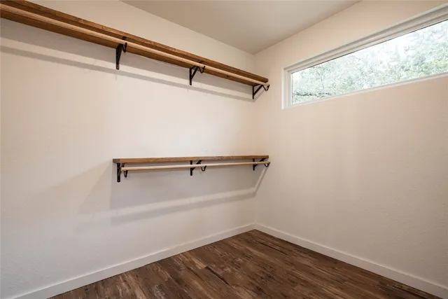 a view of a room with racks on the wall