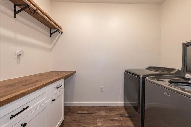 a view of a storage and utility room with closet