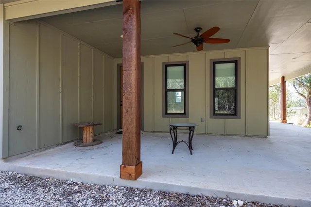 a view of a livingroom with furniture and windows