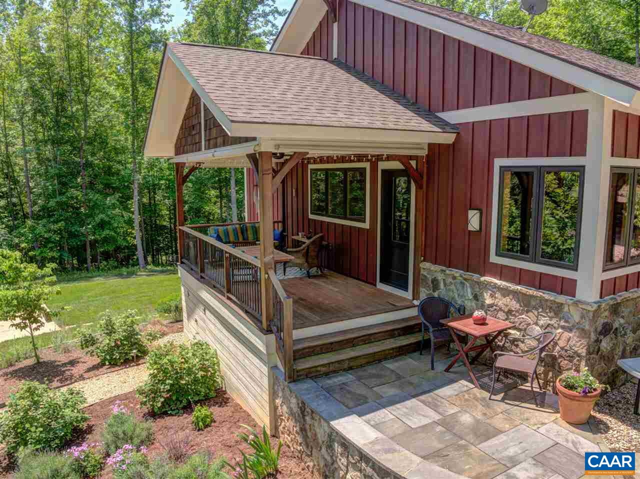 100 Miller School Road Charlottesville, VA 22903 - Photo 37 of 47 a view of a house with backyard sitting area and garden