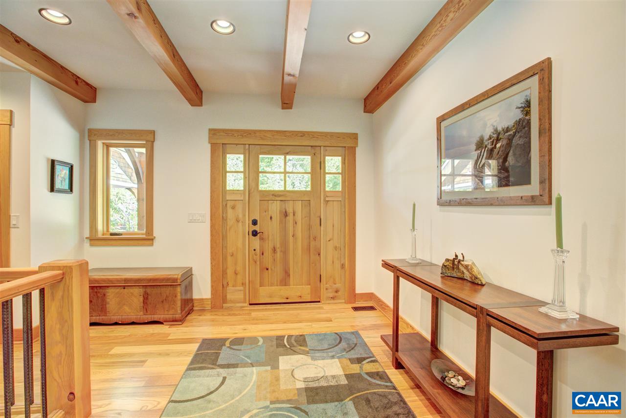 100 Miller School Road Charlottesville, VA 22903 - Photo 41 of 47 a view of a hallway with wooden floor and staircase