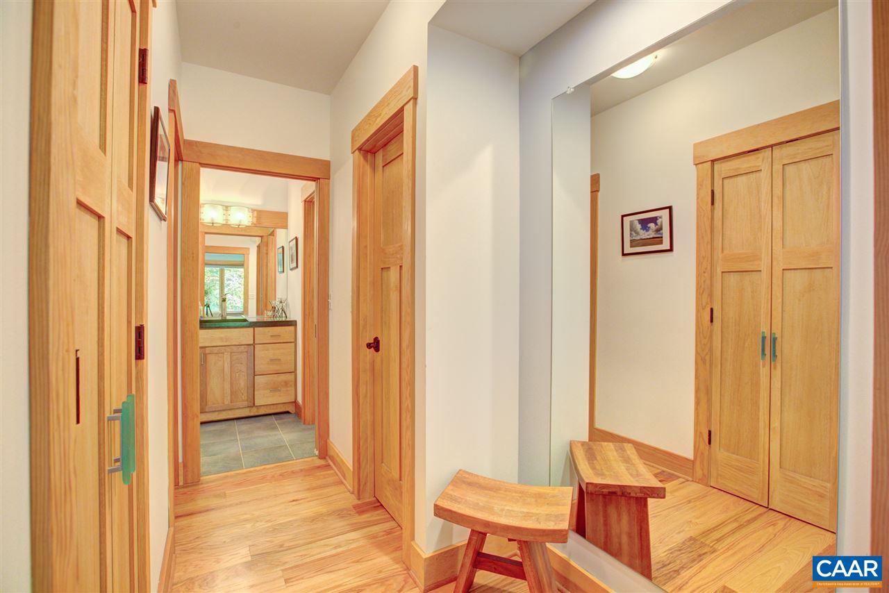 100 Miller School Road Charlottesville, VA 22903 - Photo 42 of 47 a view of a hallway with wooden shelves