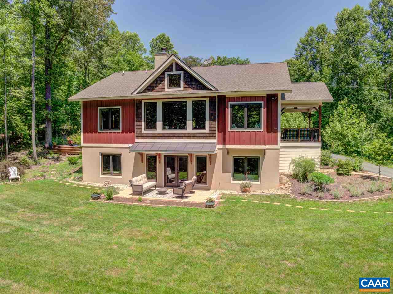 100 Miller School Road Charlottesville, VA 22903 - Photo 47 of 47 a front view of a house with a yard table and chairs