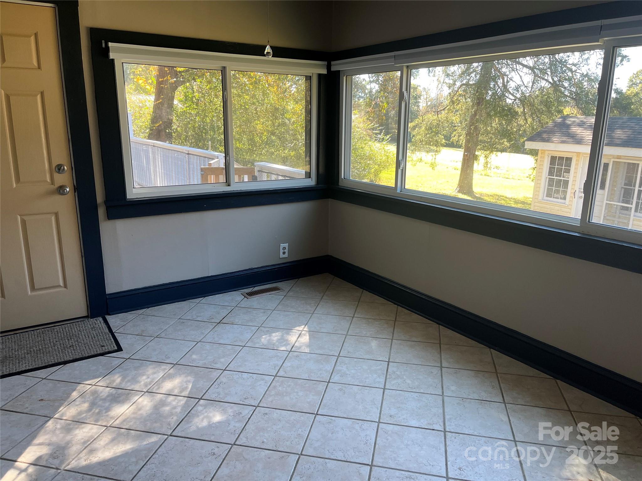 9404 Providence Road South Waxhaw, NC 28173 - Photo 17 of 45 a view of an empty room with a window