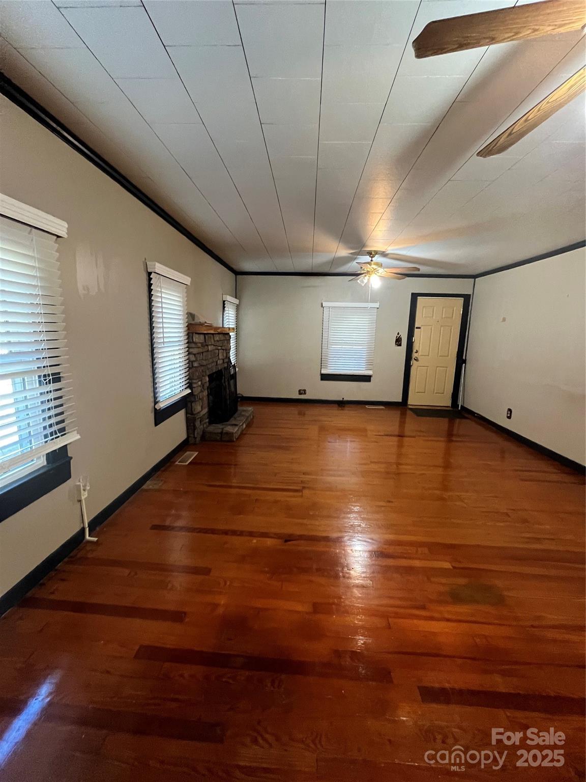 9404 Providence Road South Waxhaw, NC 28173 - Photo 20 of 45 a view of empty room with wooden floor