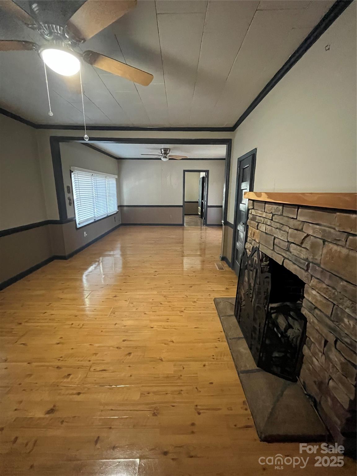 9404 Providence Road South Waxhaw, NC 28173 - Photo 27 of 45 a living room with furniture and a fireplace