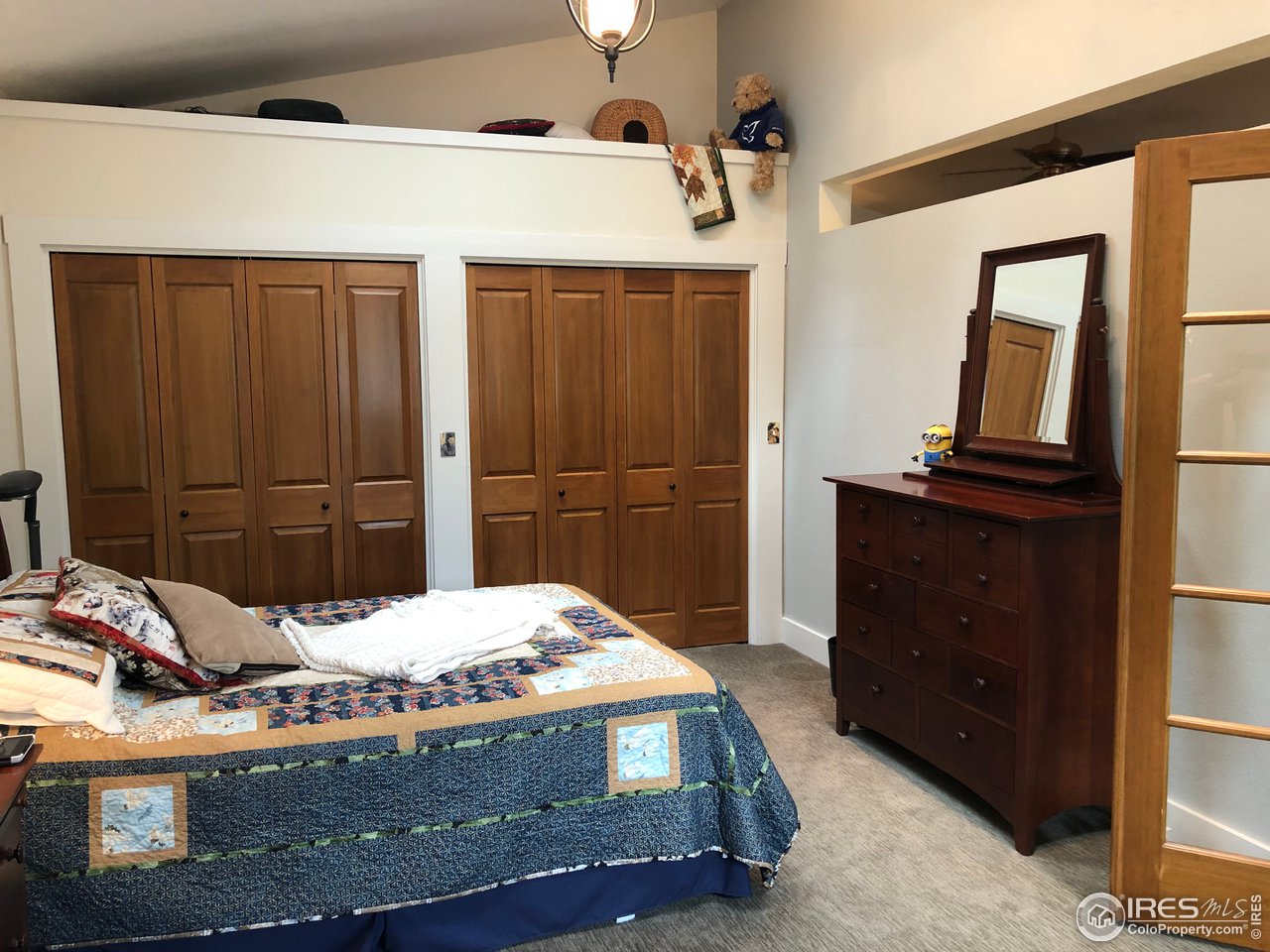 5860 Stove Prairie Road Bellvue, CO 80512 - Photo 23 of 40 2nd Bedroom with Vaulted Ceiling & Double Closets