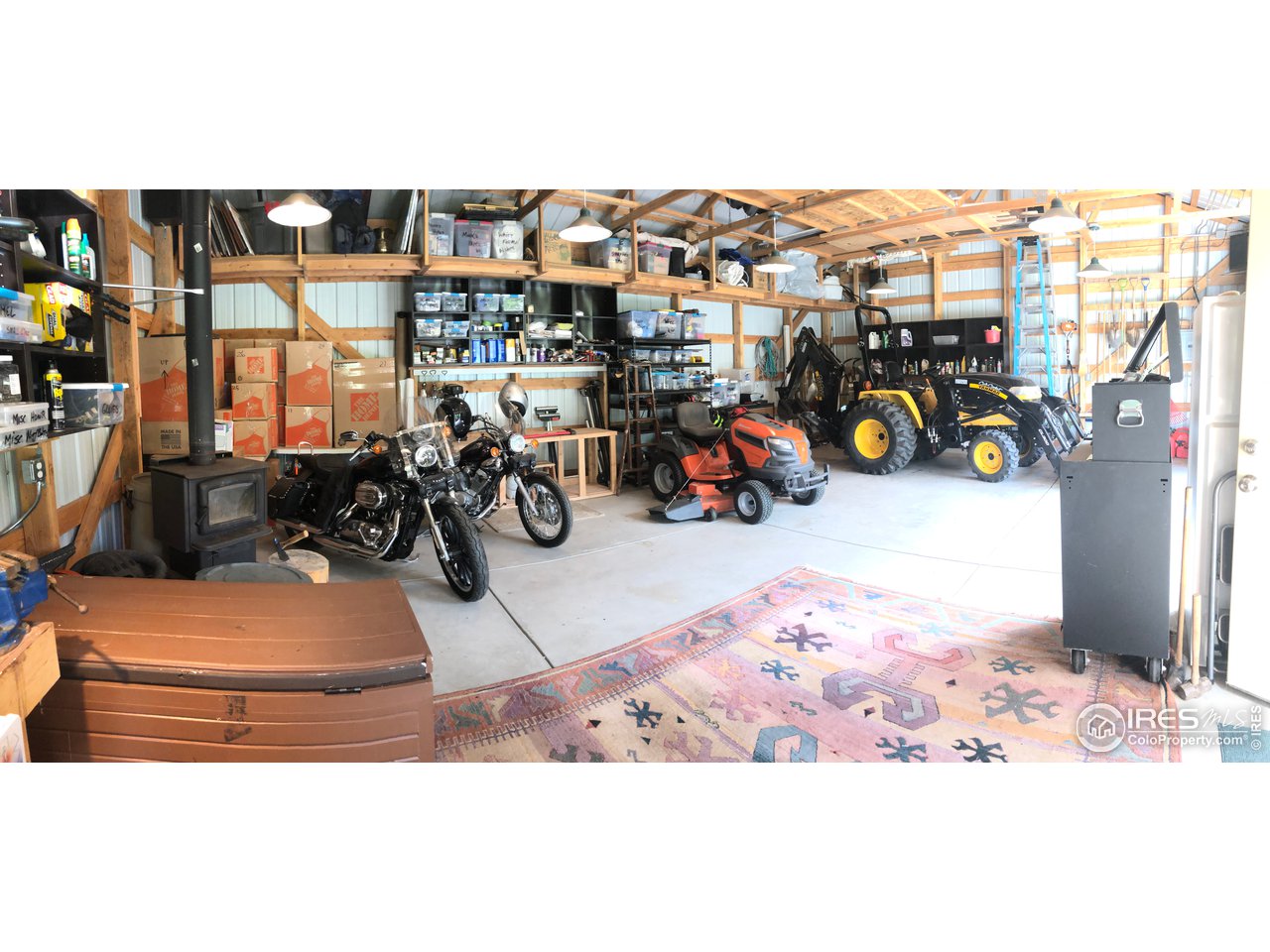 5860 Stove Prairie Road Bellvue, CO 80512 - Photo 31 of 40 Pole Barn 9'-Door, 10'-Ceiling & Shelving