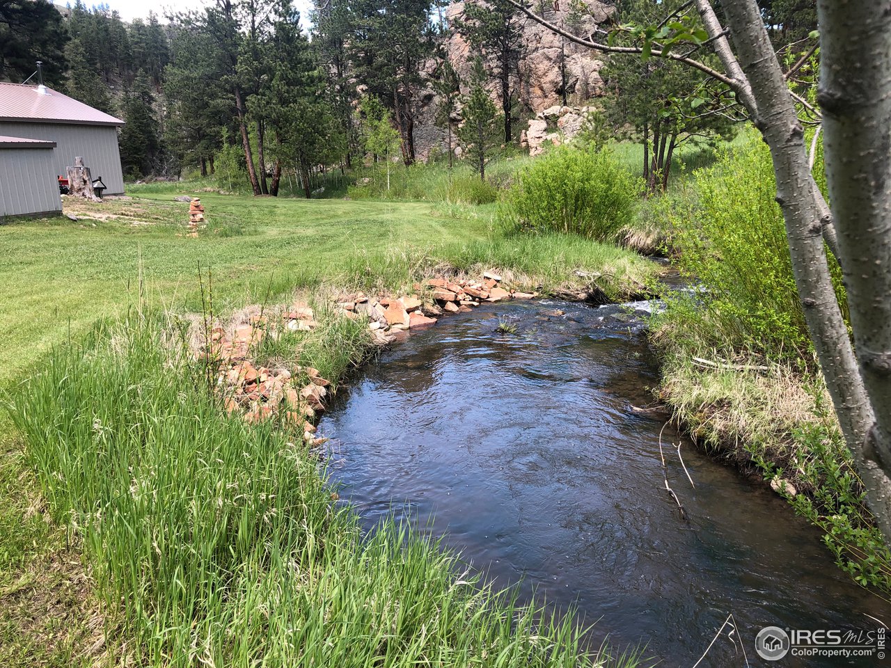 5860 Stove Prairie Road Bellvue, CO 80512 - Photo 35 of 40 View from the Foot Bridge Across the Creek