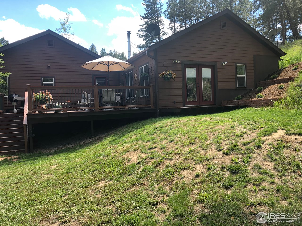 5860 Stove Prairie Road Bellvue, CO 80512 - Photo 38 of 40 Private Decks on the Back of the Home