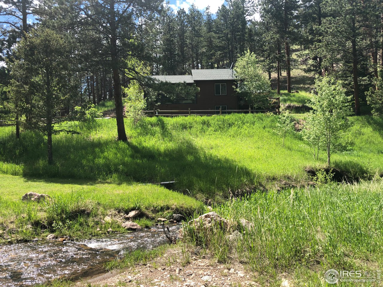 View from the Creek Across the Meadow to the House