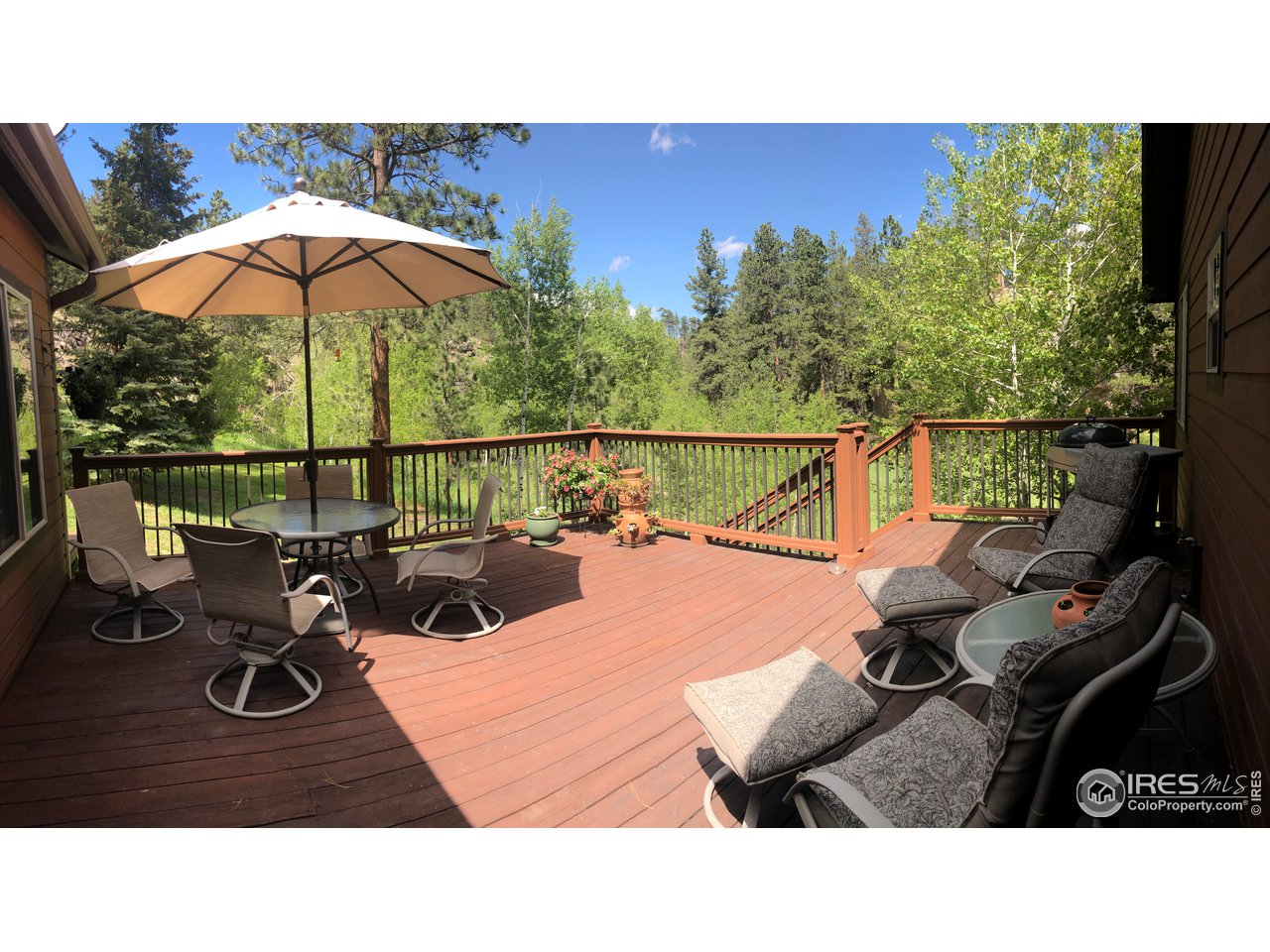 5860 Stove Prairie Road Bellvue, CO 80512 - Photo 9 of 40 Large Deck-Relax & Enjoy the Sounds of the Creek