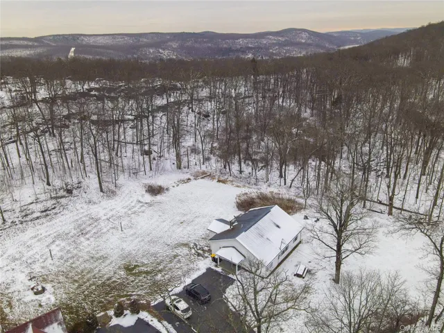 a view of a lake with mountains in the background