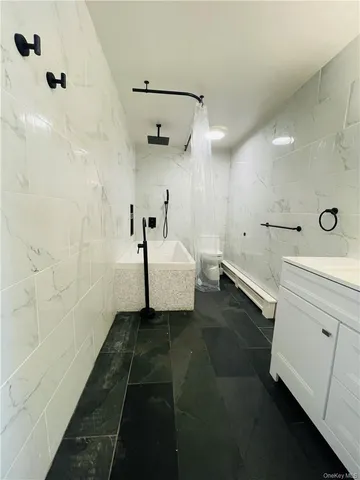 a bathroom with a sink and mirror