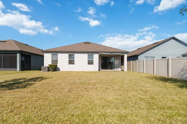 a house with yard in front of it