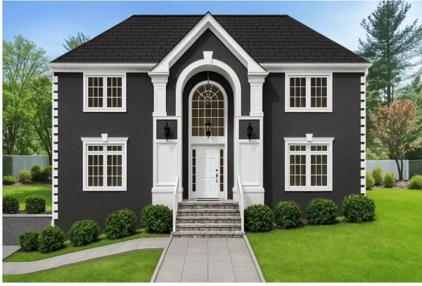 a front view of a house with garden