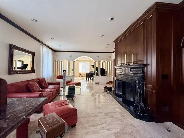 a dining room with furniture and window