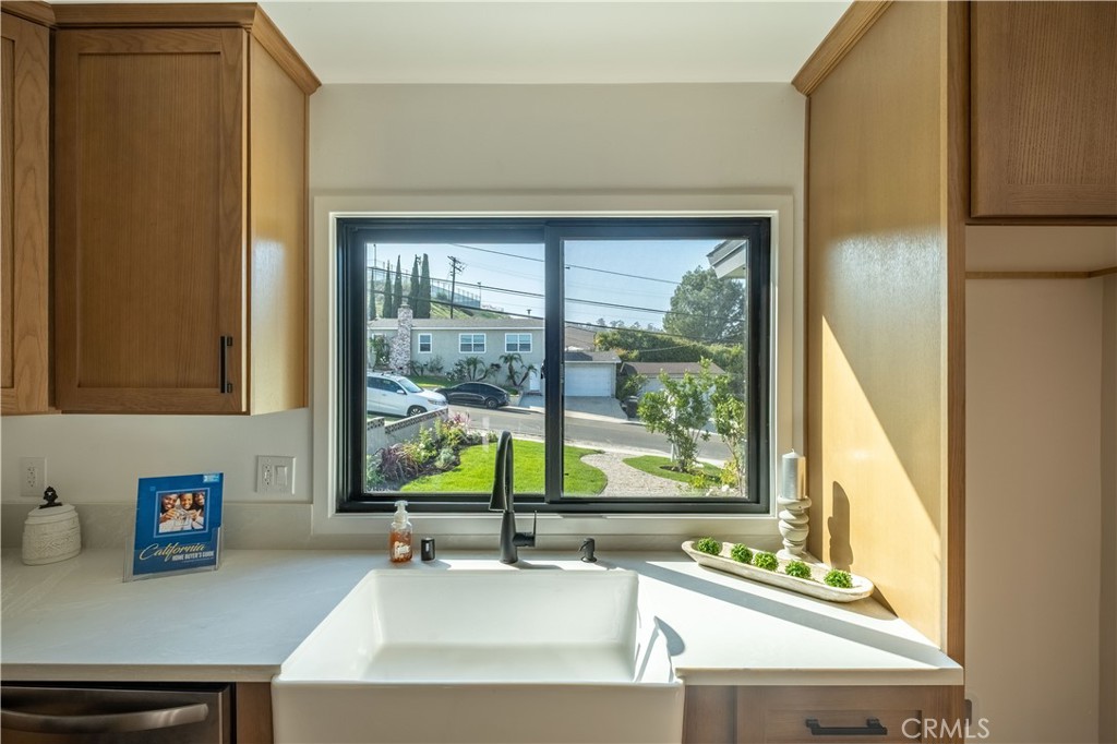 25710 Crest Road Torrance, CA 90505 - Photo 27 of 72 Enjoy a picturesque view of the front yard from your kitchen window, where natural light pours in.