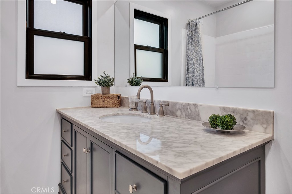 25710 Crest Road Torrance, CA 90505 - Photo 41 of 72 Recently Remodeled Full Bathroom with new vanity, new faucet fixture, new window, new mirror, new recessed lighting, new marble flooring & baseboards.