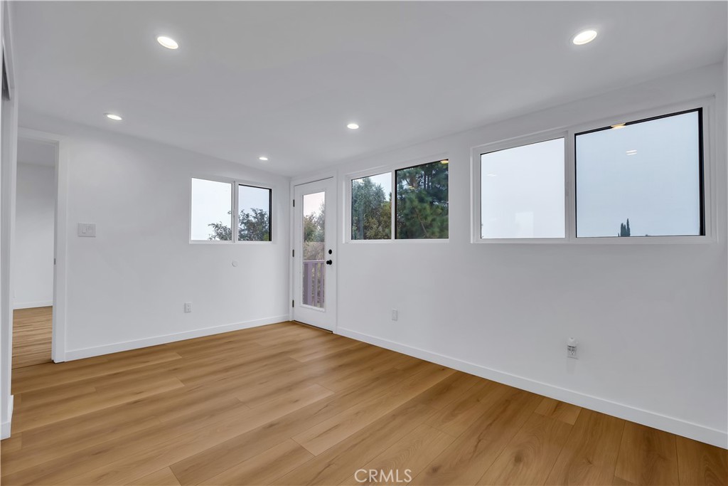 25710 Crest Road Torrance, CA 90505 - Photo 44 of 70 Converted Sunroom - Bedroom #4/Office with views, new luxury laminated floorin