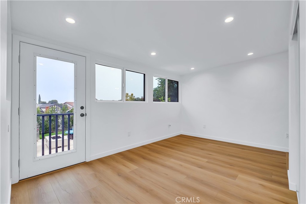 25710 Crest Road Torrance, CA 90505 - Photo 46 of 70 Converted Sunroom - Bedroom #4/Office with views, with new exterior door to your new wooden stairs leading to beautifully landscaped rear yard.
