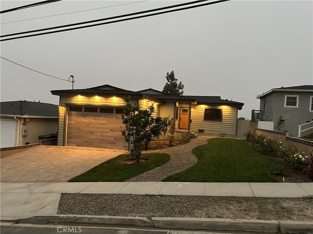 25710 Crest Road Torrance, CA 90505 - Photo 5 of 70 Photo showcasing elegant soffit lighting that enhances the home's beauty from dusk to dawn.
