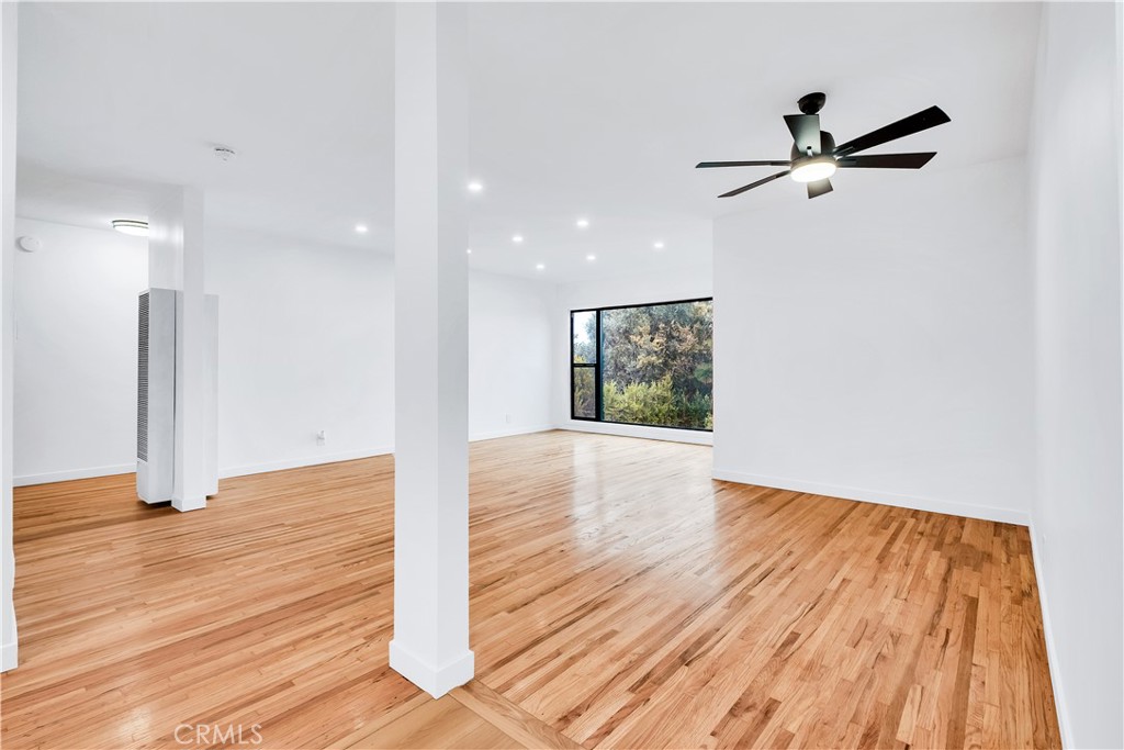 25710 Crest Road Torrance, CA 90505 - Photo 55 of 70 Rich refinished original hardwood floors stretch across the halls, living room & dining area.