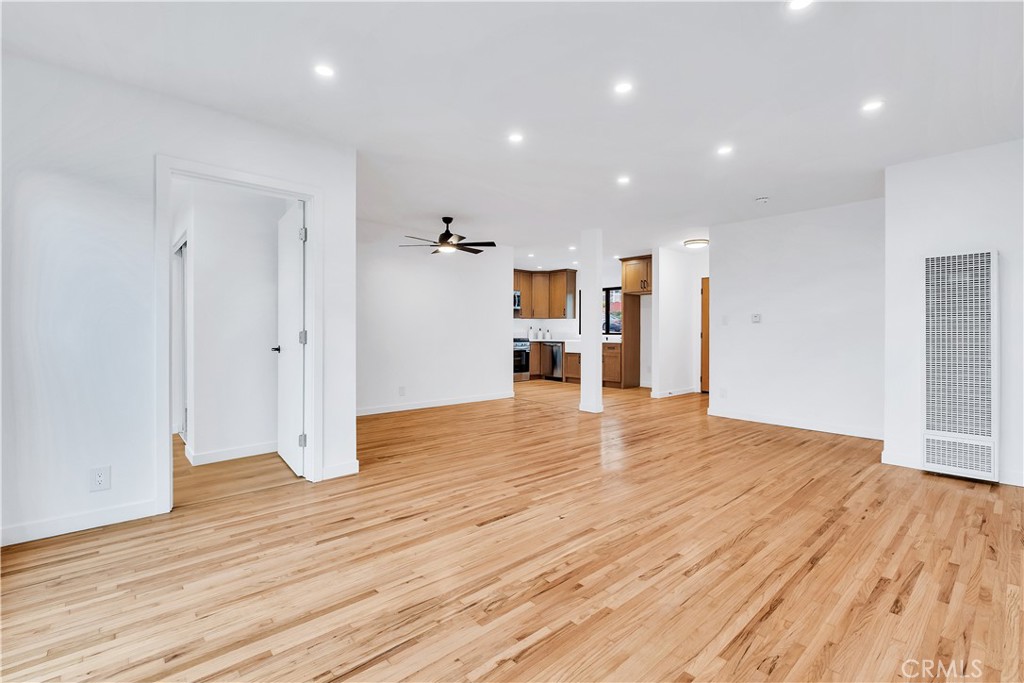 25710 Crest Road Torrance, CA 90505 - Photo 55 of 72 Another angle view from your open Living Room with natural lighting, 4th Bedroom/Office, Dining Area, beautiful Kitchen & Hallway leading to your additional 3 Bedrooms.
