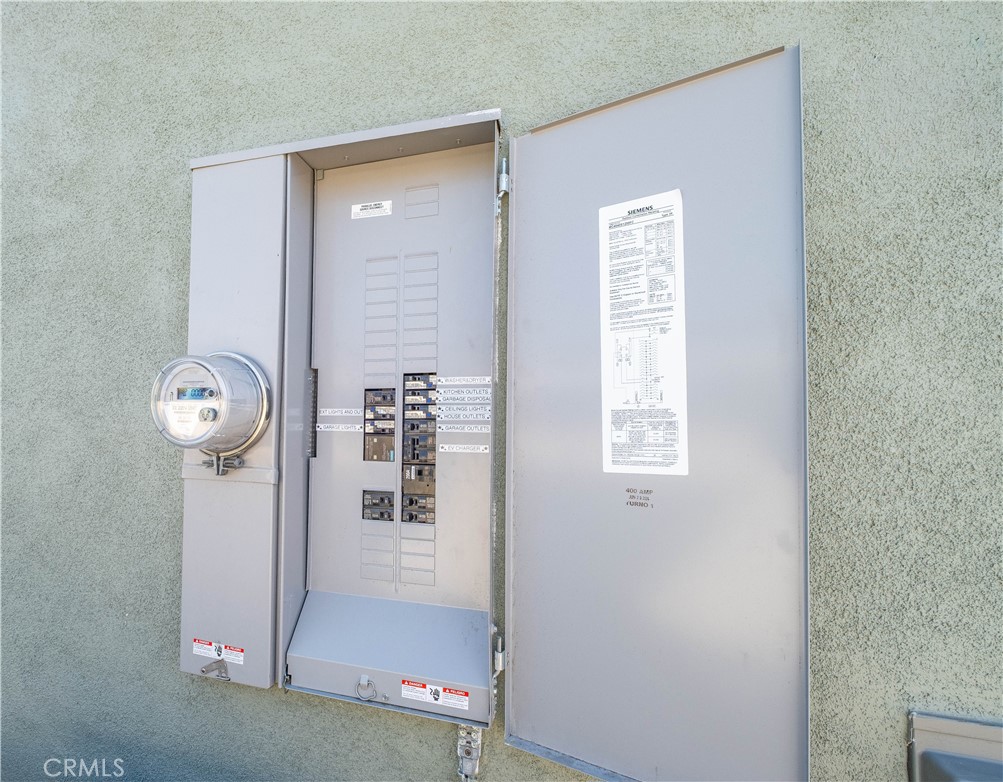 25710 Crest Road Torrance, CA 90505 - Photo 68 of 72 New 200 AMP electrical panel with AV charger in garage.