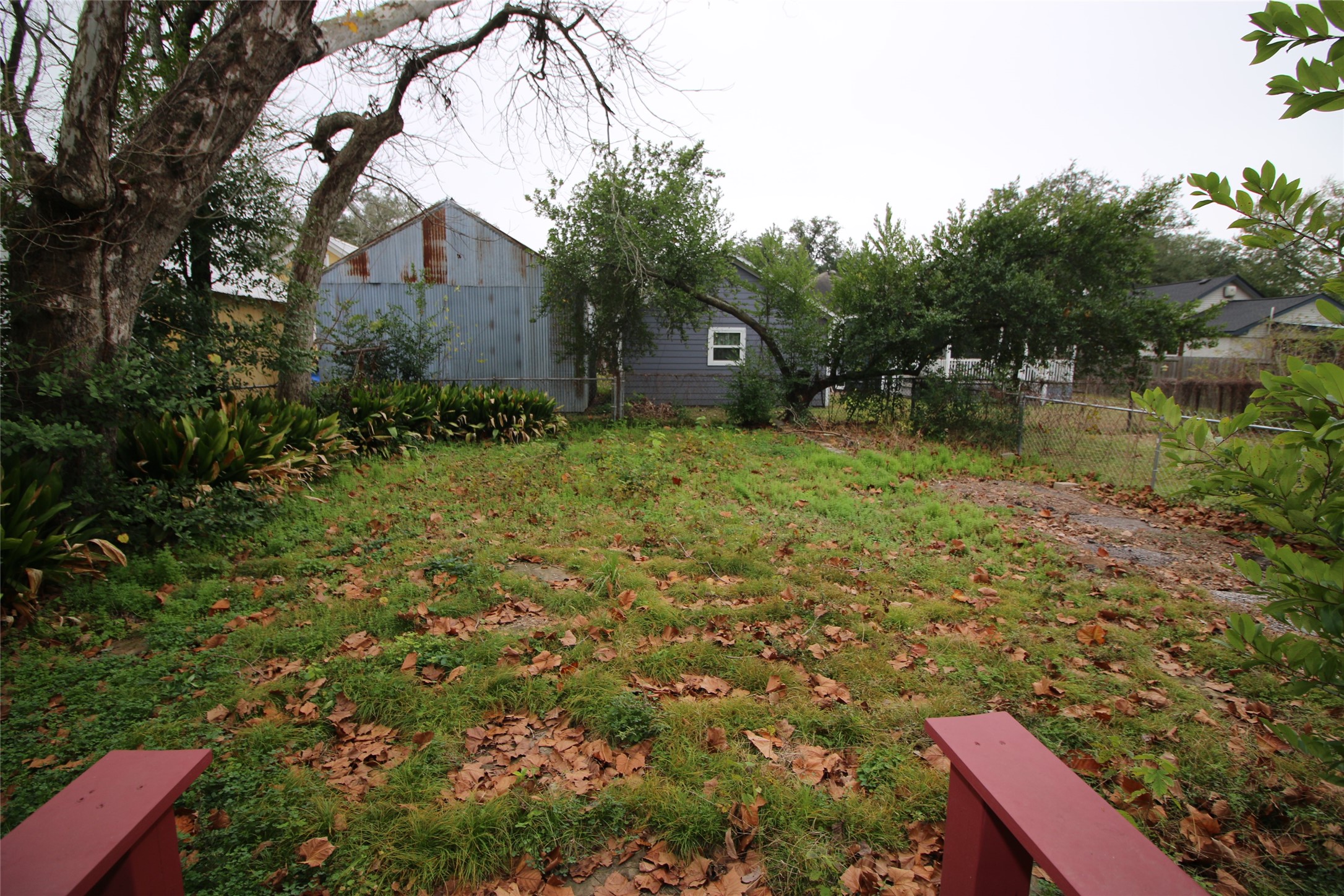 418 3rd Street Humble, TX 77338 - Photo 19 of 20 Discover the potential of this spacious yard, perfect for outdoor gatherings and personal retreats.