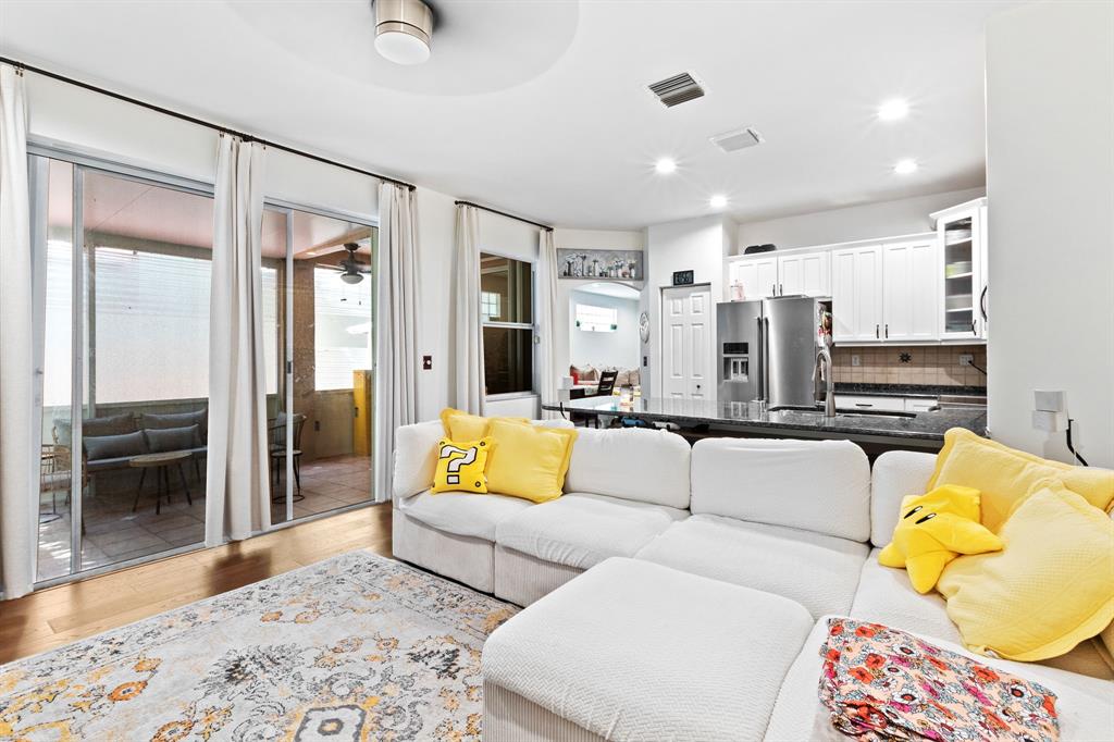 4035 Tree Top Road Cooper City, FL 33026 - Photo 14 of 33 a living room with furniture and a rug