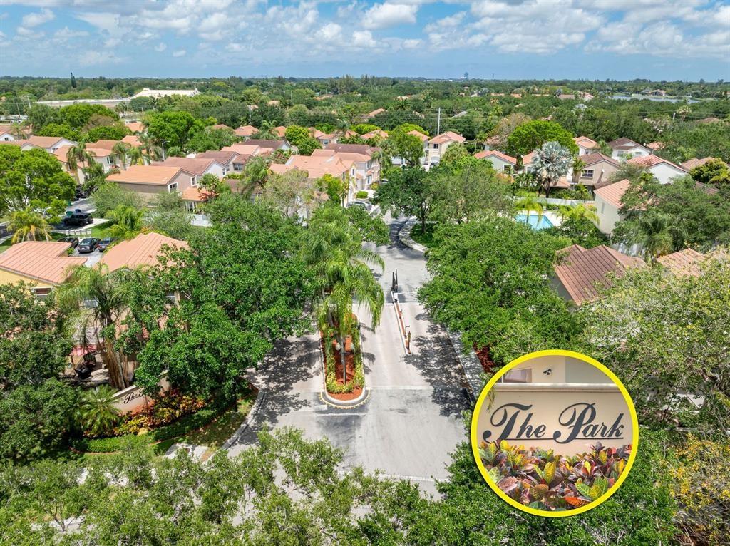 4035 Tree Top Road Cooper City, FL 33026 - Photo 29 of 33 an aerial view of a house with a garden and lake view
