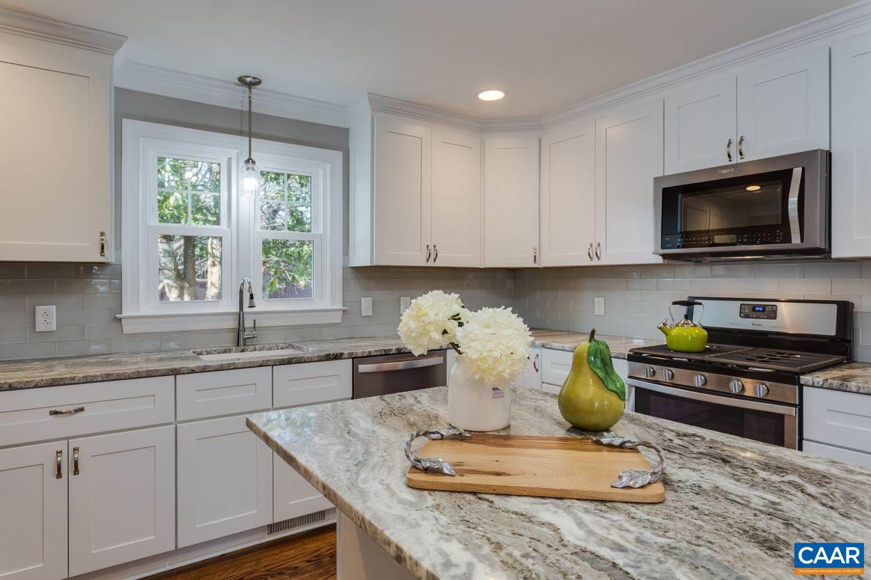 111 Westminster Road Charlottesville, VA 22901 - Photo 16 of 39 a kitchen with a stove a sink and a microwave