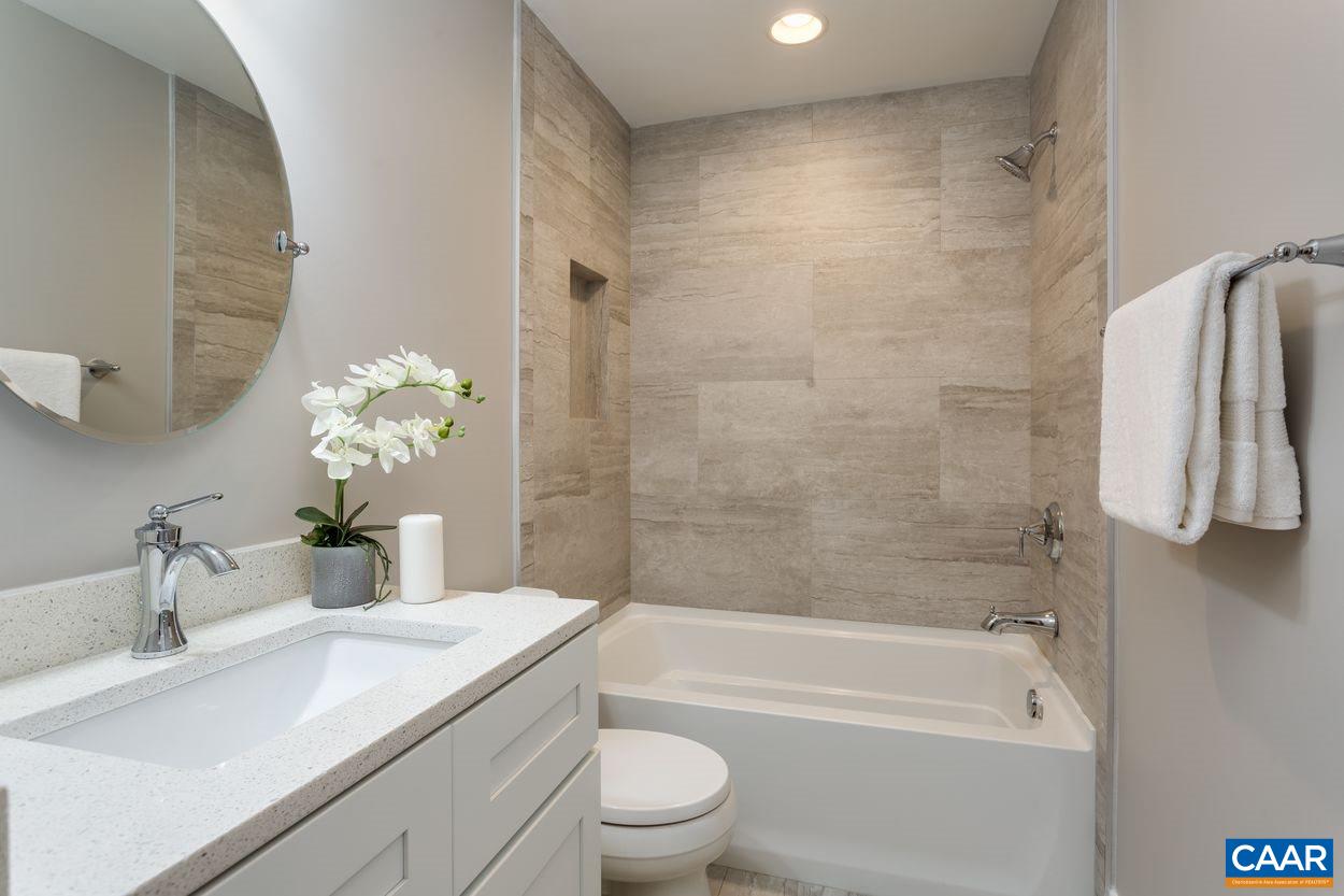 111 Westminster Road Charlottesville, VA 22901 - Photo 35 of 39 a bathroom with a sink a toilet and a bathtub