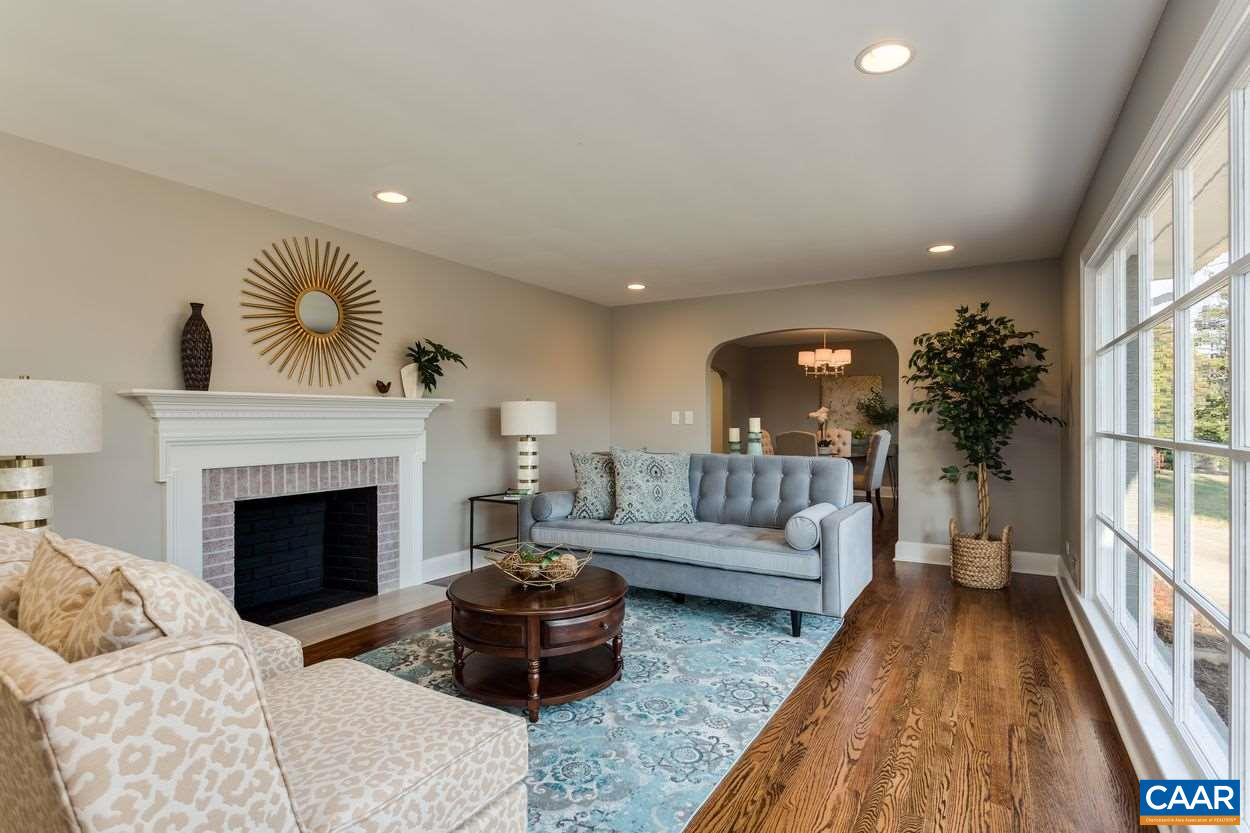 111 Westminster Road Charlottesville, VA 22901 - Photo 8 of 39 a living room with furniture and a fireplace