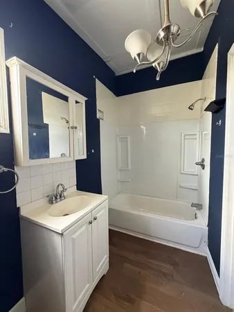 a kitchen with a stove and a sink