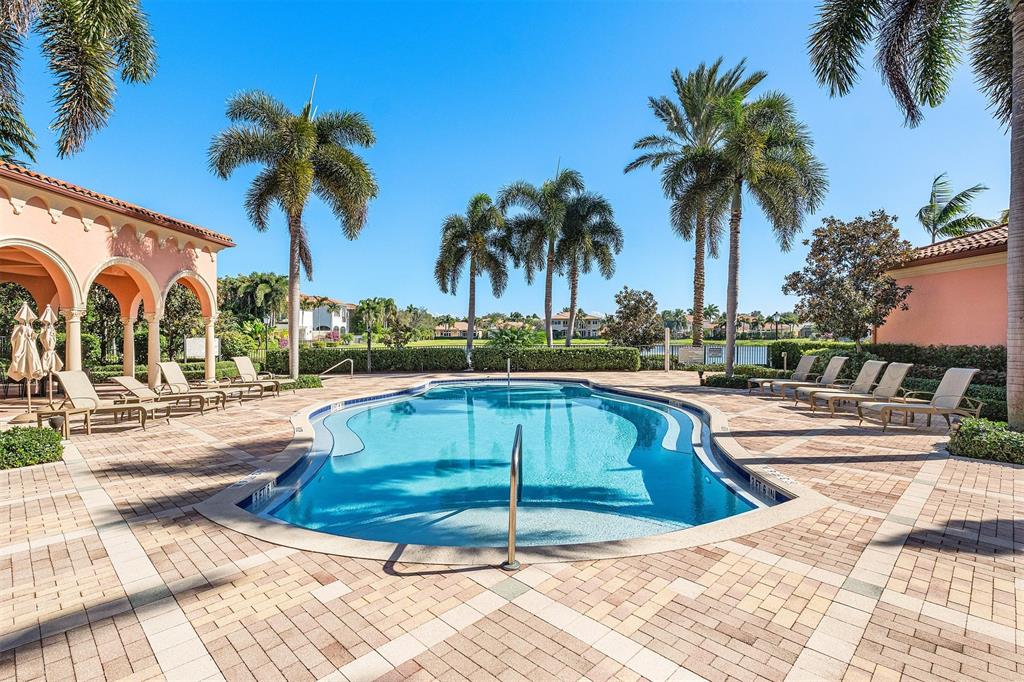 6453 Montesito Street Boca Raton, FL 33496 - Photo 50 of 60 a view of a swimming pool with a patio
