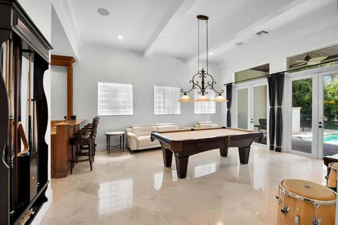 a bedroom with a bed and a table in it