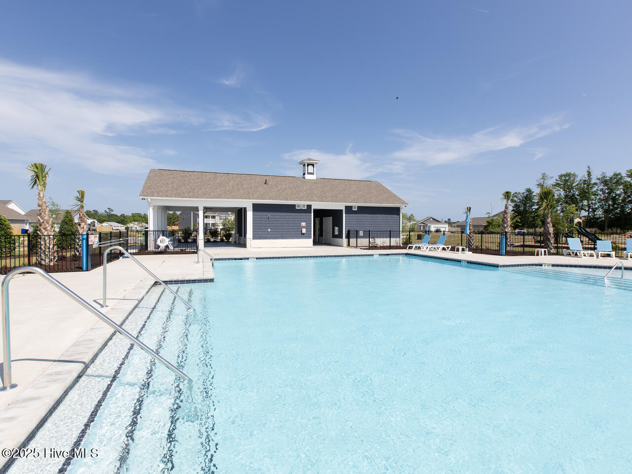 128 North Grassland Road, Unit 11 Surf City, NC 28445 - Photo 37 of 49 Waterside pool 52023L33A4604-019-016-128
