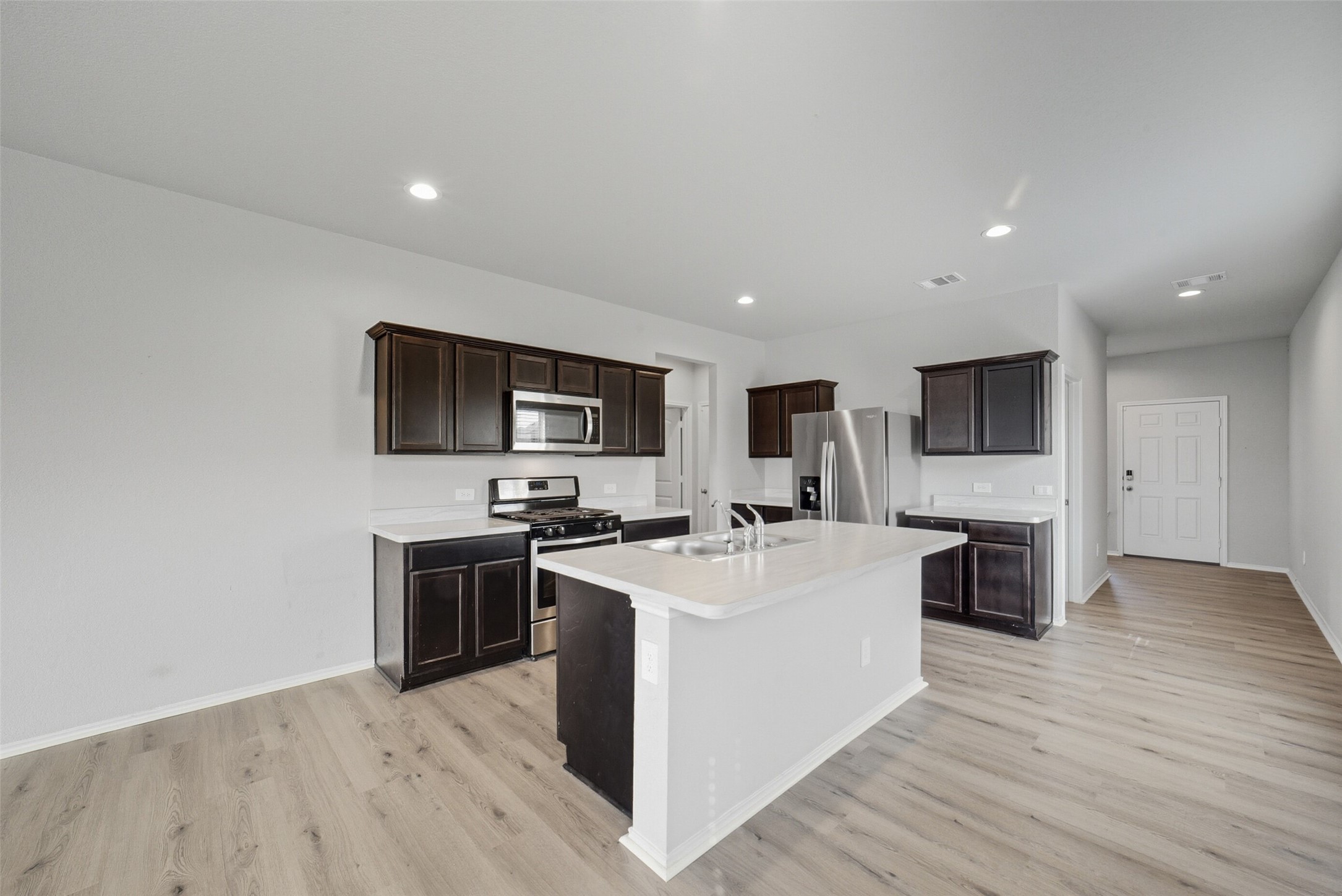 16524 Cascading Pnes Court Conroe, TX 77302 - Photo 10 of 34 Large island with space for breakfast stools.