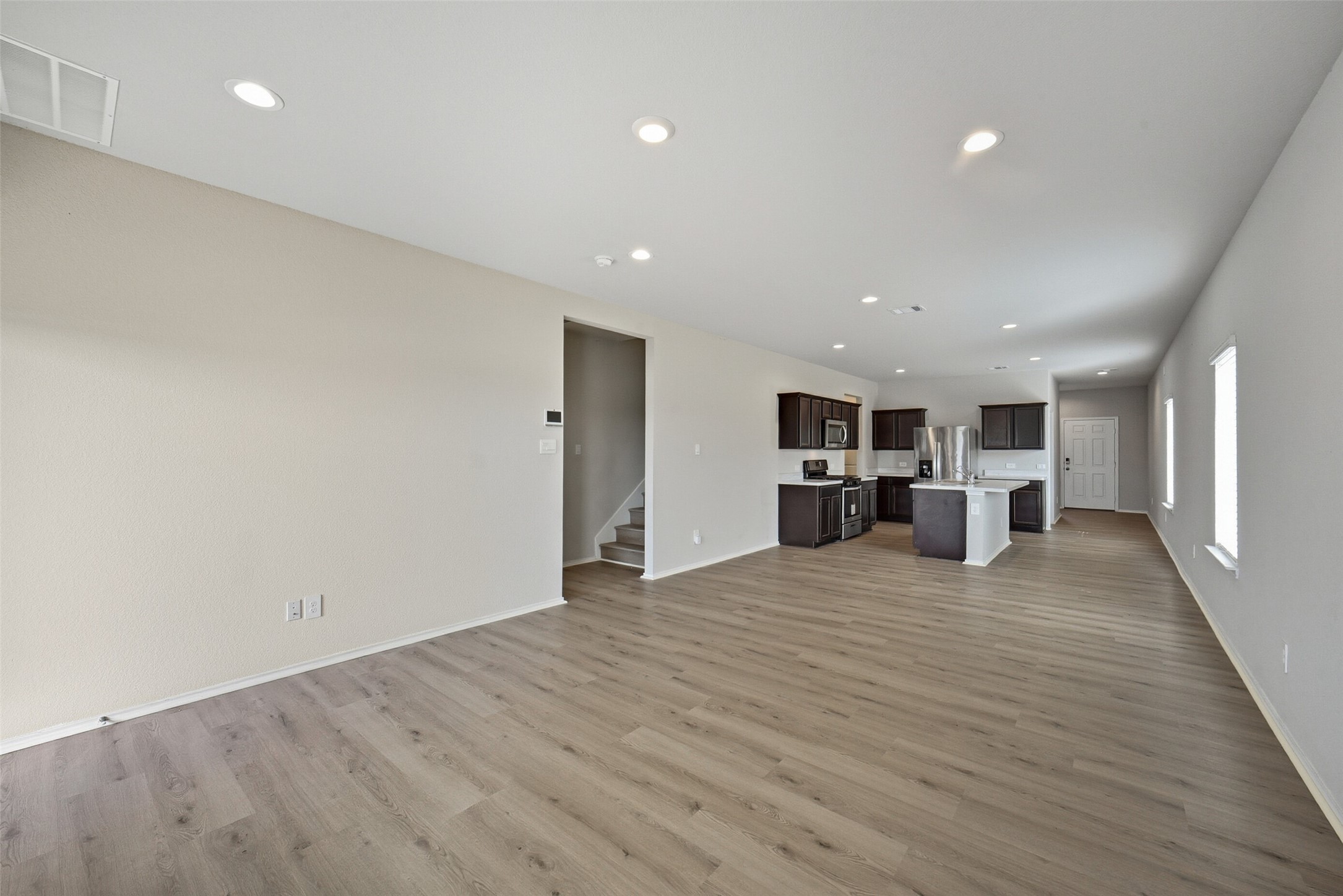 16524 Cascading Pnes Court Conroe, TX 77302 - Photo 32 of 34 Open floor plan is perfect for all your family gatherings.