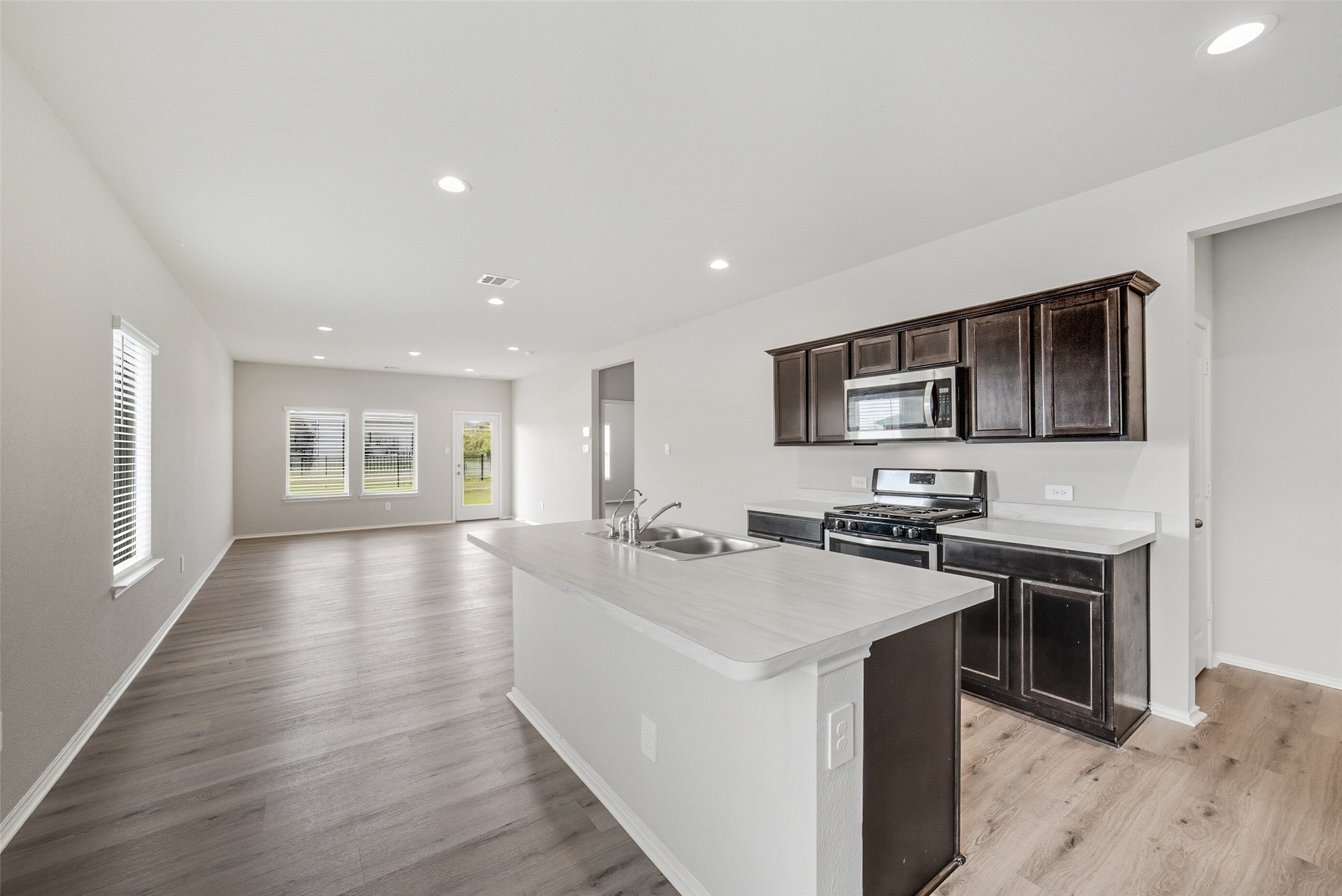 16524 Cascading Pnes Court Conroe, TX 77302 - Photo 4 of 34 This kitchen offers stainless steel appliance, large island and ample counter space.