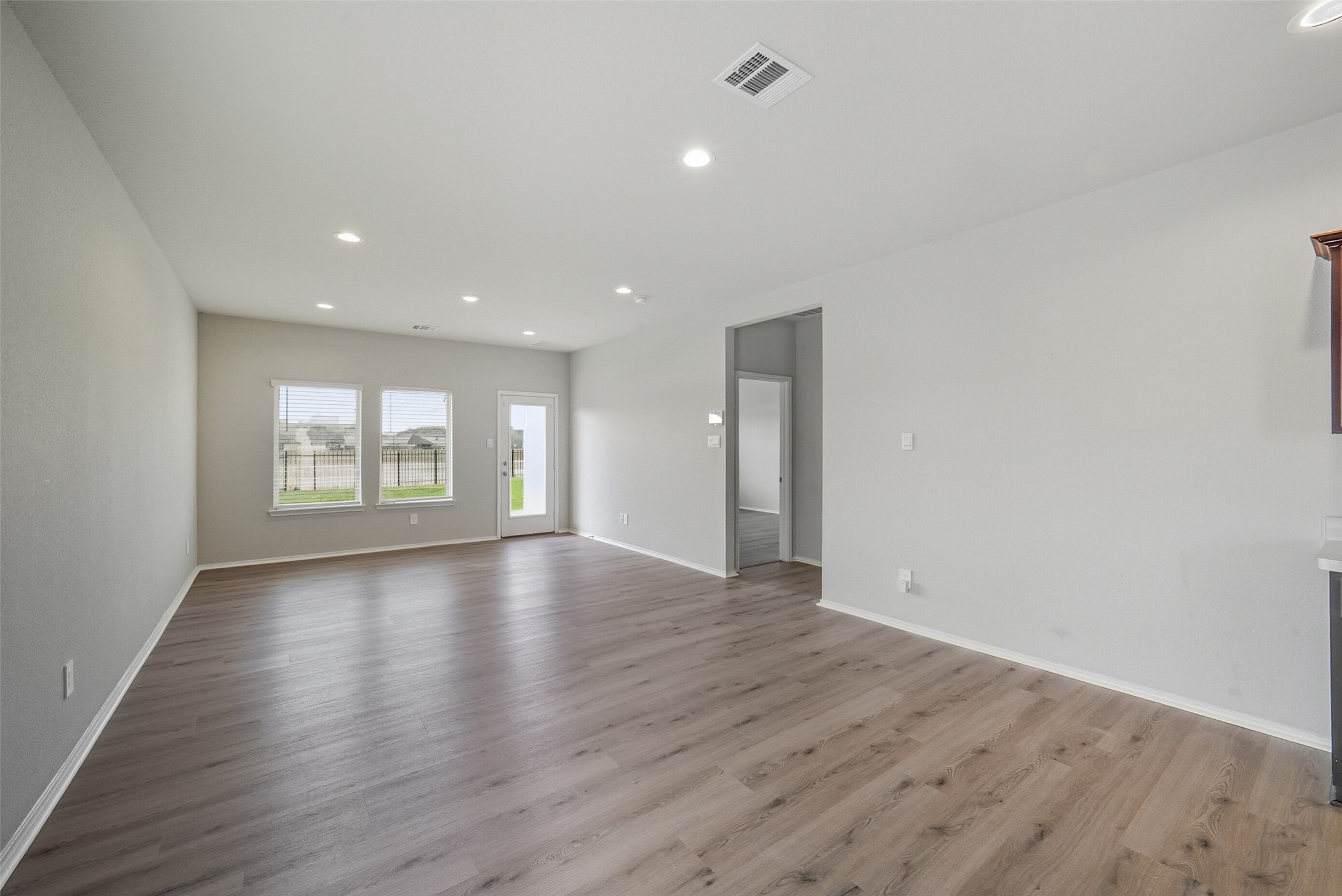 16524 Cascading Pnes Court Conroe, TX 77302 - Photo 8 of 34 BRAND NEW FLOORS THROUGHOUT THE HOUSE.
