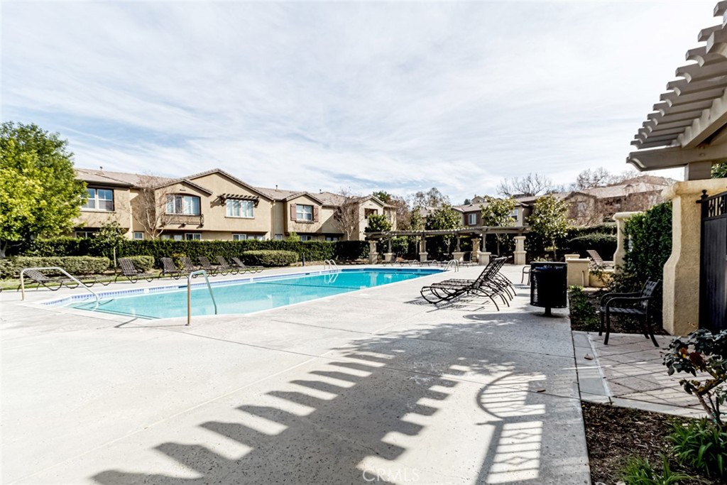25562 Huxley Drive Stevenson Ranch, CA 91381 - Photo 17 of 24 a view of a street with houses