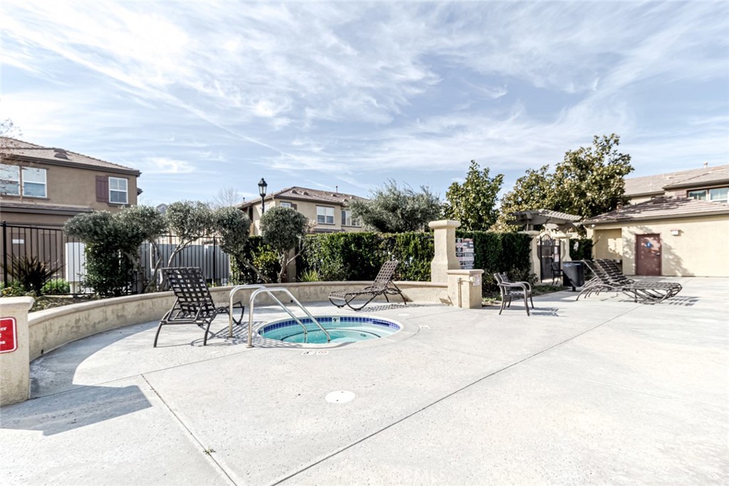 25562 Huxley Drive Stevenson Ranch, CA 91381 - Photo 18 of 24 a view of a patio with swimming pool