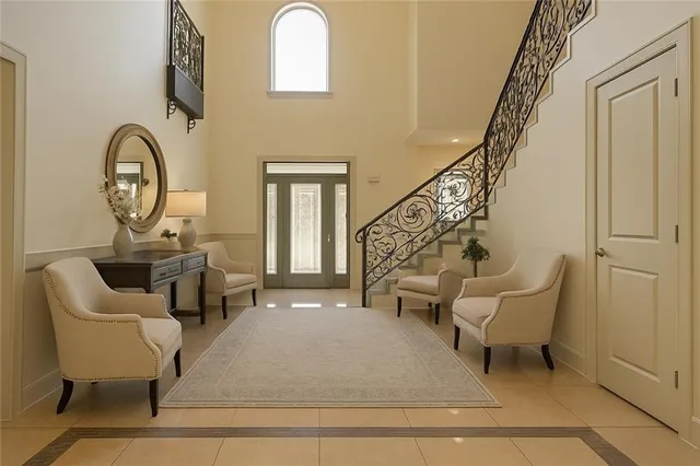 a kitchen with stainless steel appliances granite countertop a stove and a refrigerator