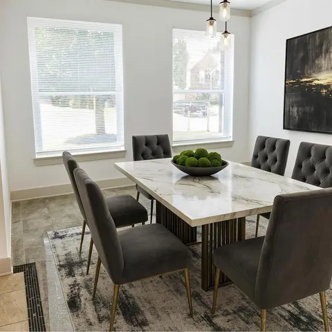 a large kitchen with kitchen island a sink stove and refrigerator