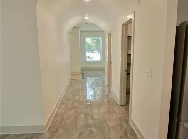 a living room with fireplace furniture and a flat screen tv