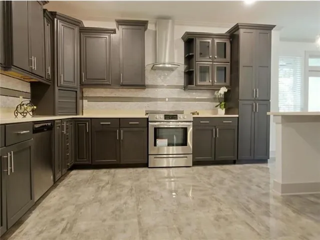 a view of a livingroom with wooden floor and window